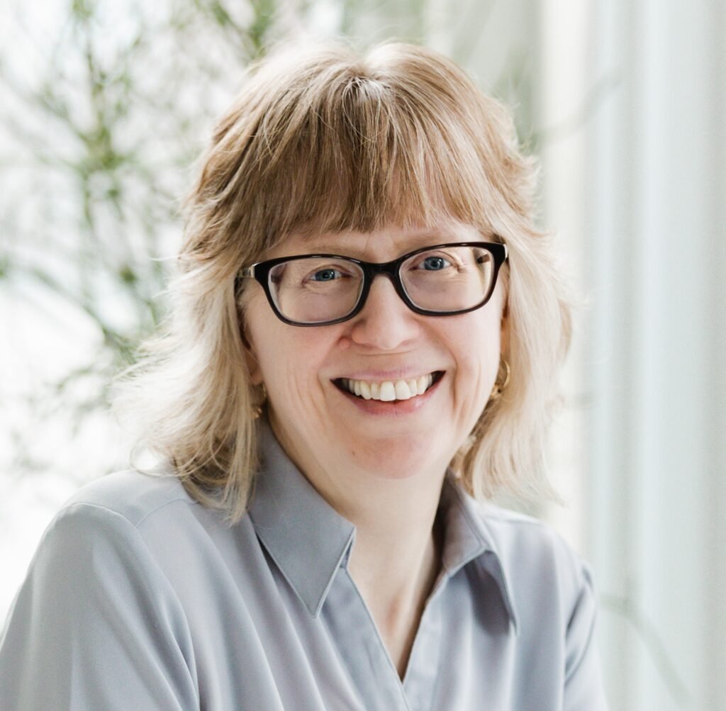 Erin Brenner gray shirt cropped